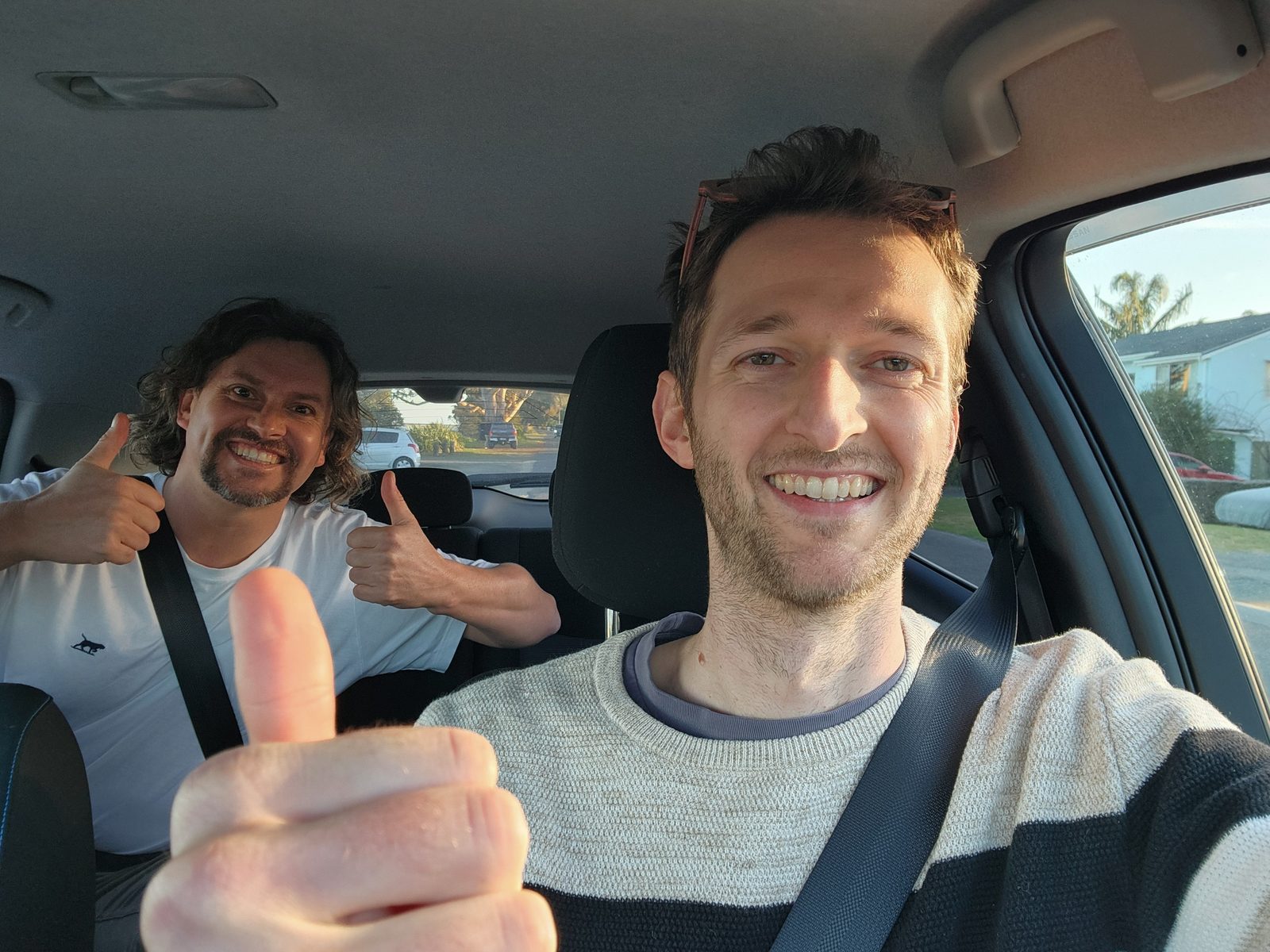 Vince and Ben, Pooly’s co-founders, giving a thumbs up from the car